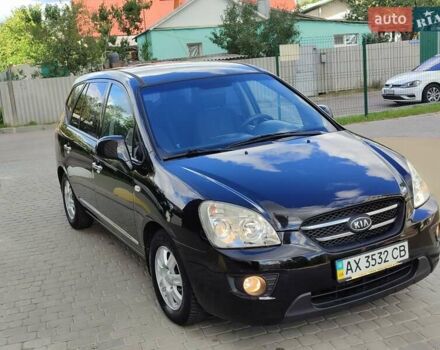 Чорний Кіа Каренс, об'ємом двигуна 2 л та пробігом 191 тис. км за 6500 $, фото 1 на Automoto.ua