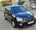 Чорний Кіа Каренс, об'ємом двигуна 2 л та пробігом 191 тис. км за 6500 $, фото 1 на Automoto.ua