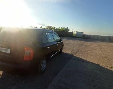 Чорний Кіа Каренс, об'ємом двигуна 2 л та пробігом 234 тис. км за 5500 $, фото 16 на Automoto.ua