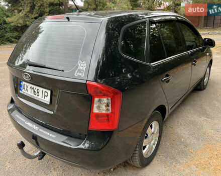 Кіа Каренс 2008 у Харкові на Automoto.ua Чорний Кіа Каренс, об'ємом двигуна 2 л та пробігом 207 тис. км за 7000 $, фото 4 на Automoto.ua