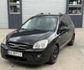 Чорний Кіа Каренс, об'ємом двигуна 2 л та пробігом 199 тис. км за 2597 $, фото 1 на Automoto.ua