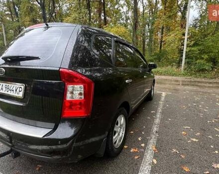 Чорний Кіа Каренс, об'ємом двигуна 2 л та пробігом 207 тис. км за 6500 $, фото 2 на Automoto.ua