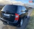 Черный Киа Каренс, объемом двигателя 2 л и пробегом 265 тыс. км за 4700 $, фото 2 на Automoto.ua