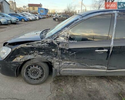 Черный Киа Каренс, объемом двигателя 2 л и пробегом 340 тыс. км за 3000 $, фото 10 на Automoto.ua