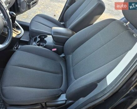 Чорний Кіа Каренс, об'ємом двигуна 2 л та пробігом 88 тис. км за 6450 $, фото 45 на Automoto.ua