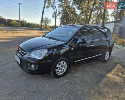 Чорний Кіа Каренс, об'ємом двигуна 2 л та пробігом 88 тис. км за 6450 $, фото 25 на Automoto.ua