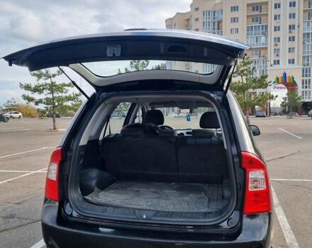 Черный Киа Каренс, объемом двигателя 2 л и пробегом 347 тыс. км за 5500 $, фото 4 на Automoto.ua