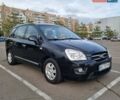Черный Киа Каренс, объемом двигателя 2 л и пробегом 347 тыс. км за 5500 $, фото 1 на Automoto.ua