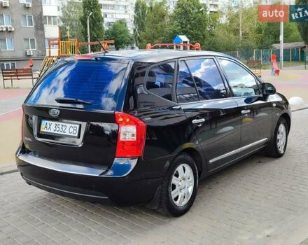 Чорний Кіа Каренс, об'ємом двигуна 2 л та пробігом 191 тис. км за 6500 $, фото 29 на Automoto.ua
