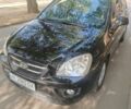 Киа Каренс 2008 в Кривом Роге на Automoto.ua Черный Киа Каренс, объемом двигателя 2 л и пробегом 335 тыс. км за 6300 $, фото 1 на Automoto.ua