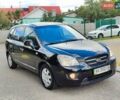 Чорний Кіа Каренс, об'ємом двигуна 2 л та пробігом 191 тис. км за 6500 $, фото 7 на Automoto.ua