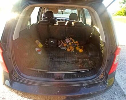 Чорний Кіа Каренс, об'ємом двигуна 2 л та пробігом 234 тис. км за 5500 $, фото 15 на Automoto.ua