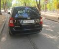Киа Каренс 2008 в Кривом Роге на Automoto.ua Черный Киа Каренс, объемом двигателя 2 л и пробегом 335 тыс. км за 6300 $, фото 2 на Automoto.ua