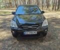Черный Киа Каренс, объемом двигателя 2 л и пробегом 195 тыс. км за 5700 $, фото 2 на Automoto.ua