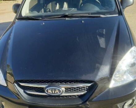 Черный Киа Каренс, объемом двигателя 2 л и пробегом 231 тыс. км за 6000 $, фото 1 на Automoto.ua