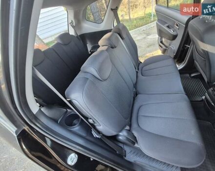 Чорний Кіа Каренс, об'ємом двигуна 2 л та пробігом 88 тис. км за 6450 $, фото 56 на Automoto.ua