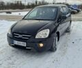 Черный Киа Каренс, объемом двигателя 2 л и пробегом 276 тыс. км за 5500 $, фото 1 на Automoto.ua
