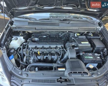 Чорний Кіа Каренс, об'ємом двигуна 2 л та пробігом 88 тис. км за 6450 $, фото 50 на Automoto.ua