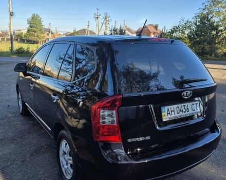 Чорний Кіа Каренс, об'ємом двигуна 2 л та пробігом 88 тис. км за 6450 $, фото 21 на Automoto.ua