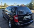 Чорний Кіа Каренс, об'ємом двигуна 2 л та пробігом 88 тис. км за 6450 $, фото 21 на Automoto.ua