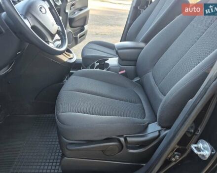 Чорний Кіа Каренс, об'ємом двигуна 2 л та пробігом 88 тис. км за 6450 $, фото 53 на Automoto.ua