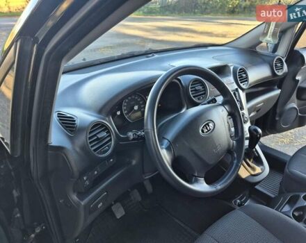 Чорний Кіа Каренс, об'ємом двигуна 2 л та пробігом 88 тис. км за 6450 $, фото 49 на Automoto.ua