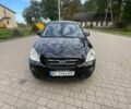 Чорний Кіа Каренс, об'ємом двигуна 2 л та пробігом 340 тис. км за 3900 $, фото 1 на Automoto.ua