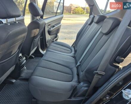 Чорний Кіа Каренс, об'ємом двигуна 2 л та пробігом 88 тис. км за 6450 $, фото 36 на Automoto.ua