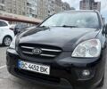 Чорний Кіа Каренс, об'ємом двигуна 2 л та пробігом 270 тис. км за 5850 $, фото 1 на Automoto.ua