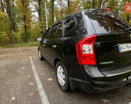 Чорний Кіа Каренс, об'ємом двигуна 2 л та пробігом 207 тис. км за 6500 $, фото 3 на Automoto.ua