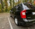 Чорний Кіа Каренс, об'ємом двигуна 2 л та пробігом 207 тис. км за 6500 $, фото 3 на Automoto.ua