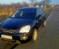 Черный Киа Каренс, объемом двигателя 2 л и пробегом 370 тыс. км за 5200 $, фото 1 на Automoto.ua