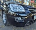 Чорний Кіа Каренс, об'ємом двигуна 2 л та пробігом 88 тис. км за 6450 $, фото 13 на Automoto.ua