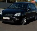 Чорний Кіа Каренс, об'ємом двигуна 1.99 л та пробігом 120 тис. км за 6900 $, фото 1 на Automoto.ua