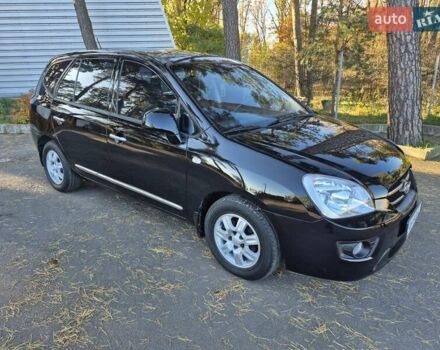 Чорний Кіа Каренс, об'ємом двигуна 2 л та пробігом 88 тис. км за 6450 $, фото 34 на Automoto.ua