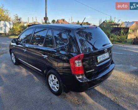 Чорний Кіа Каренс, об'ємом двигуна 2 л та пробігом 88 тис. км за 6450 $, фото 6 на Automoto.ua