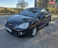 Чорний Кіа Каренс, об'ємом двигуна 2 л та пробігом 88 тис. км за 6450 $, фото 10 на Automoto.ua