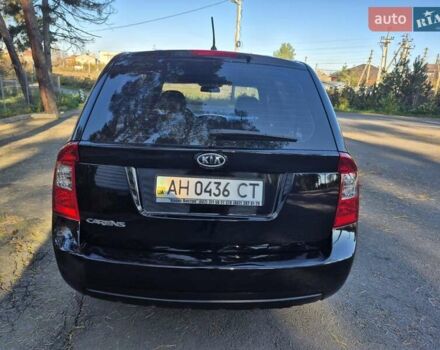 Чорний Кіа Каренс, об'ємом двигуна 2 л та пробігом 88 тис. км за 6450 $, фото 20 на Automoto.ua