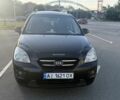 Чорний Кіа Каренс, об'ємом двигуна 2 л та пробігом 320 тис. км за 3800 $, фото 1 на Automoto.ua