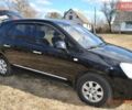 Чорний Кіа Каренс, об'ємом двигуна 2 л та пробігом 200 тис. км за 4999 $, фото 1 на Automoto.ua