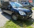 Черный Киа Каренс, объемом двигателя 2 л и пробегом 240 тыс. км за 5900 $, фото 1 на Automoto.ua