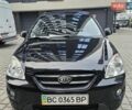 Черный Киа Каренс, объемом двигателя 2 л и пробегом 191 тыс. км за 5700 $, фото 7 на Automoto.ua