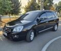 Чорний Кіа Каренс, об'ємом двигуна 2 л та пробігом 223 тис. км за 5199 $, фото 1 на Automoto.ua