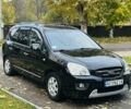 Киа Каренс 2008 в Хусте на Automoto.ua Черный Киа Каренс, объемом двигателя 2 л и пробегом 125 тыс. км за 6700 $, фото 2 на Automoto.ua