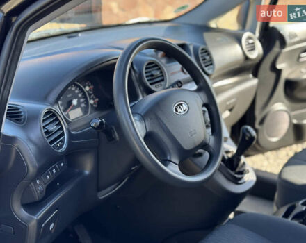 Черный Киа Каренс, объемом двигателя 2 л и пробегом 148 тыс. км за 7250 $, фото 14 на Automoto.ua