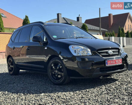 Черный Киа Каренс, объемом двигателя 2 л и пробегом 148 тыс. км за 7250 $, фото 2 на Automoto.ua