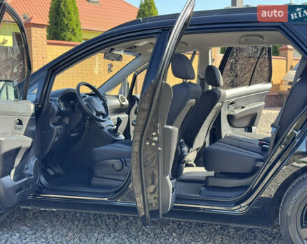 Черный Киа Каренс, объемом двигателя 2 л и пробегом 148 тыс. км за 7250 $, фото 12 на Automoto.ua