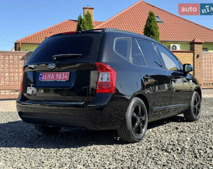 Черный Киа Каренс, объемом двигателя 2 л и пробегом 148 тыс. км за 7250 $, фото 11 на Automoto.ua