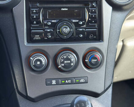 Черный Киа Каренс, объемом двигателя 2 л и пробегом 148 тыс. км за 7250 $, фото 26 на Automoto.ua