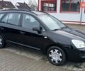Чорний Кіа Каренс, об'ємом двигуна 1.99 л та пробігом 233 тис. км за 3500 $, фото 18 на Automoto.ua
